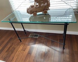 Third glass and metal table in the set