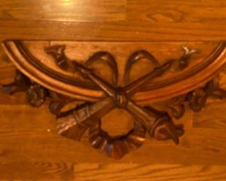 Wooden accoutrement for accentuating a work of art