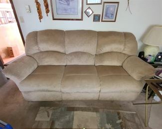 Reclining sofa available for presale faux suede