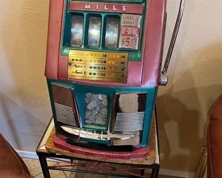 Mills Antique slot machine - very rare. Comes with bonus quarters inside