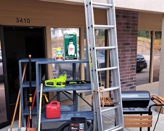 Much outdoor items and tools. Wet/dry vacuums, 28' ext. ladder, storage shelves, outdoor hand tools