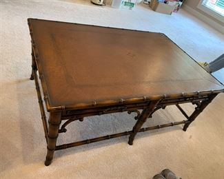 #19	Bamboo/Wood Coffee Table w/leather top - 44x30x18  (two drawers opening on either side)	 $100.00 			
