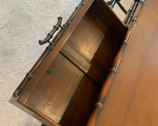 #19	Bamboo/Wood Coffee Table w/leather top - 44x30x18  (two drawers opening on either side)	 $100.00 			
