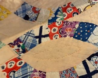 #80	Scrappy Chain Hand-quilted 60x80	 $75.00 			
