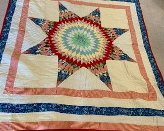 #83	Texas Star Scrappy Star Hand-quilted Quilt - 66x76	 $65.00 			
