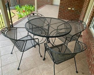 #127	42x30 black metal table with 4 chairs	 $125.00 			

