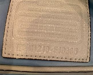 #138	coach cream color bag with shoulder straps  number is m1249-f18285 w bag	 $60.00 			
