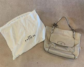 #138	coach cream color bag with shoulder straps  number is m1249-f18285 w bag	 $60.00 			
