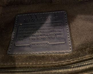 #139	coach fabric purple aqua bag with shoulder back and long strap 	 $40.00 			
