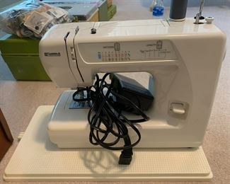 #142	kenmore sewing machine in plastic case 	 $25.00 			
