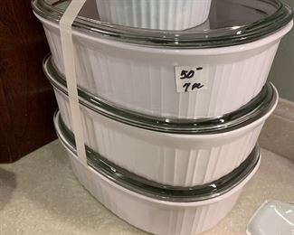 #210	7 pc White Serving Bowls w/lids (one missing lid)	 $50.00 			
