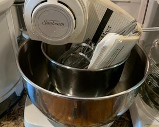 #220	Sunbeam Stand Deluxe Mixer w/2 stainless steel bowl w/ 2 regular & Bread Beaters	 $30.00 			
