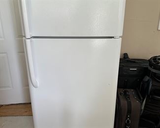 #235 Frigidaire frig with out icemaker, freezer on top white . $200 