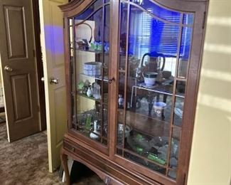 This China cabinet is old and in great shape. 