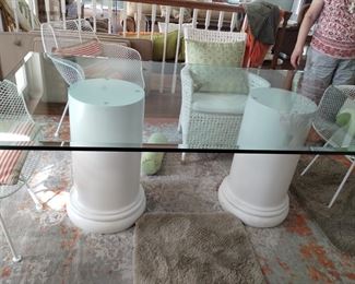 HEAVY GLASS TOP Table with columns (chairs not included). $400 
MUST HAVE STRONG HELP TO MOVE THIS TABLE.