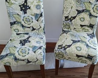 Super Cute Accent Chairs with slip covers 
$100 for the Pair