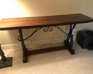 Very cool flip out console with iron scroll base.