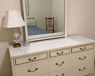 Dresser With Mirror And Decorative Lamp