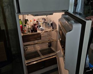 fridge  located down stairs. Bring help and a dolly to load at end of day. Thanks