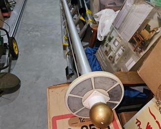 tall flag pole located downstairs.