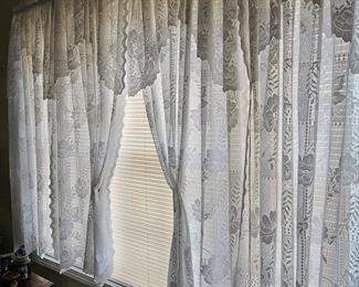 All draperies are for sale, including the ones lace like this. rods go with. Many windows throughout house.