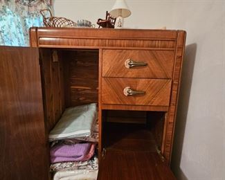 Open view of Waterfall clothes closet.  Cedar on left