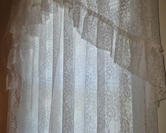 all curtains / seers for sale with rods.