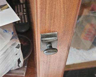 Detail of the TV chest with storage. Nice