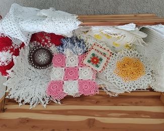 Various handmade doilies