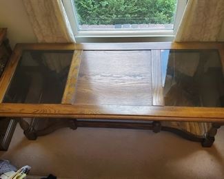 Glass-top coffee table