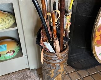 Vintage umbrellas in stand