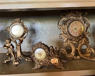 Art Nouveau gilded gold tone clocks