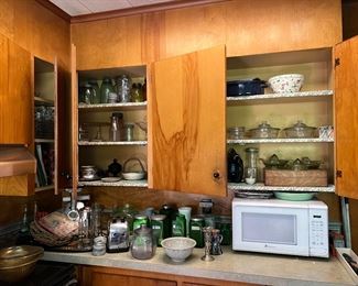 Vintage everywhere you look! Depression glass bowls and more.