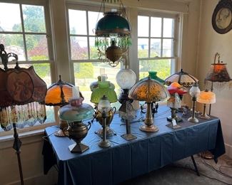 Dozens of antique lamps in Victorian, Asian, Art Deco, and Art Nouveau styles