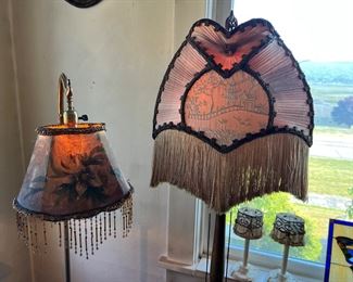 Rare antique standing lamps with beaded and fringe shades. One with painted flowers, and the other with embroidered Asian scene (potentially Chinese buildings). Both in working condition. 