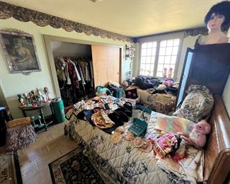 Vintage handbags, hats, clothes, fabrics and accessories fill this room and closet!