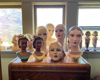 Vintage mannequin heads for display of hats and accessories, with wonderful vintage makeup and hair styles