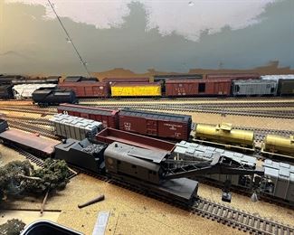 Dozens and Dozens of model trains - engines, boxcars and tracks, stations, bridges and parts!