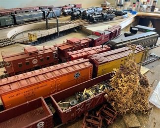 Dozens and Dozens of model trains - engines, boxcars and tracks, stations, bridges and parts!
