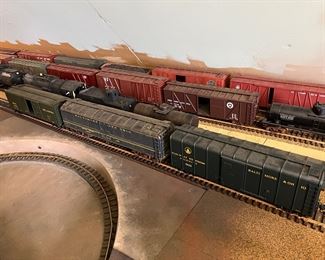 Dozens and Dozens of model trains - engines, boxcars and tracks, stations, bridges and parts!