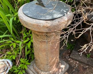 concrete base column with metal sundial