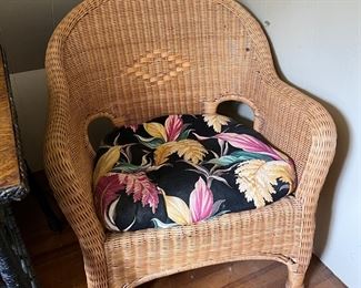 Newer nice condition wicker chairs with matching vintage floral cushions 