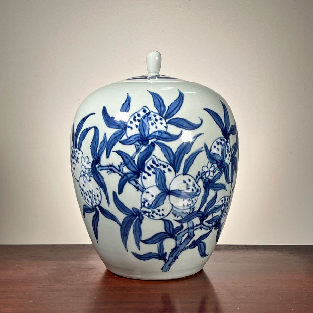 CHINESE GINGER JAR | Blue and white glazed porcelain lidded ginger Jar with blue flower decoration. - h. 11.5 x dia. 8 in