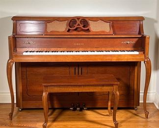 YAMAHA PIANO AND BENCH | Yamaha M405 upright piano with matching bench.