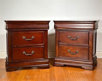 (2PC) PAIR MAHOGANY NIGHTSTANDS | Pair of wooden bedside tables, each with two drawers, by Davis International Furniture. - l. 26 x w. 18 x h. 29 in