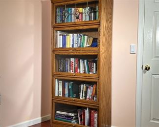 OAK BARRISTER BOOKCASE | Five shelves with sliding glass doors, top door with leaded glass. - l. 32.5 x w. 13 x h. 73 in