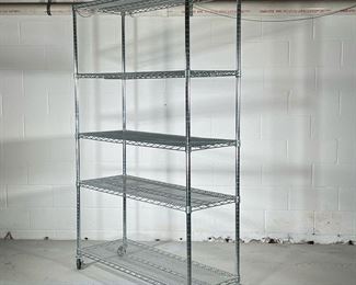 LARGE CHROME SHELVING UNIT | Large wheeled shelving unit with 5 grated shelves. - l. 48 x w. 18 x h. 75.5 in