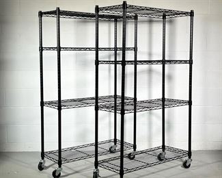 (2PC) BLACK METAL SHELVING UNITS | Black shelving units on wheels, each with 4 grated shelves. - l. 36 x w. 14 x h. 58 in