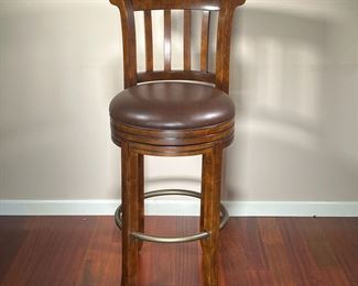 SWIVEL TOP BARSTOOL | Howard Miller barstool, dark wood with cushioned seat and wood back featuring brass ring around legs. - h. 45.5 x dia. 20 in