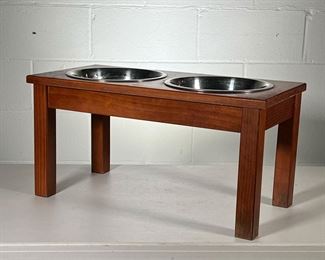 DOG FEEDING STAND | 2 stainless steel dog bowls in wood stand with cutouts. - l. 23.5 x w. 11.5 x h. 12 in